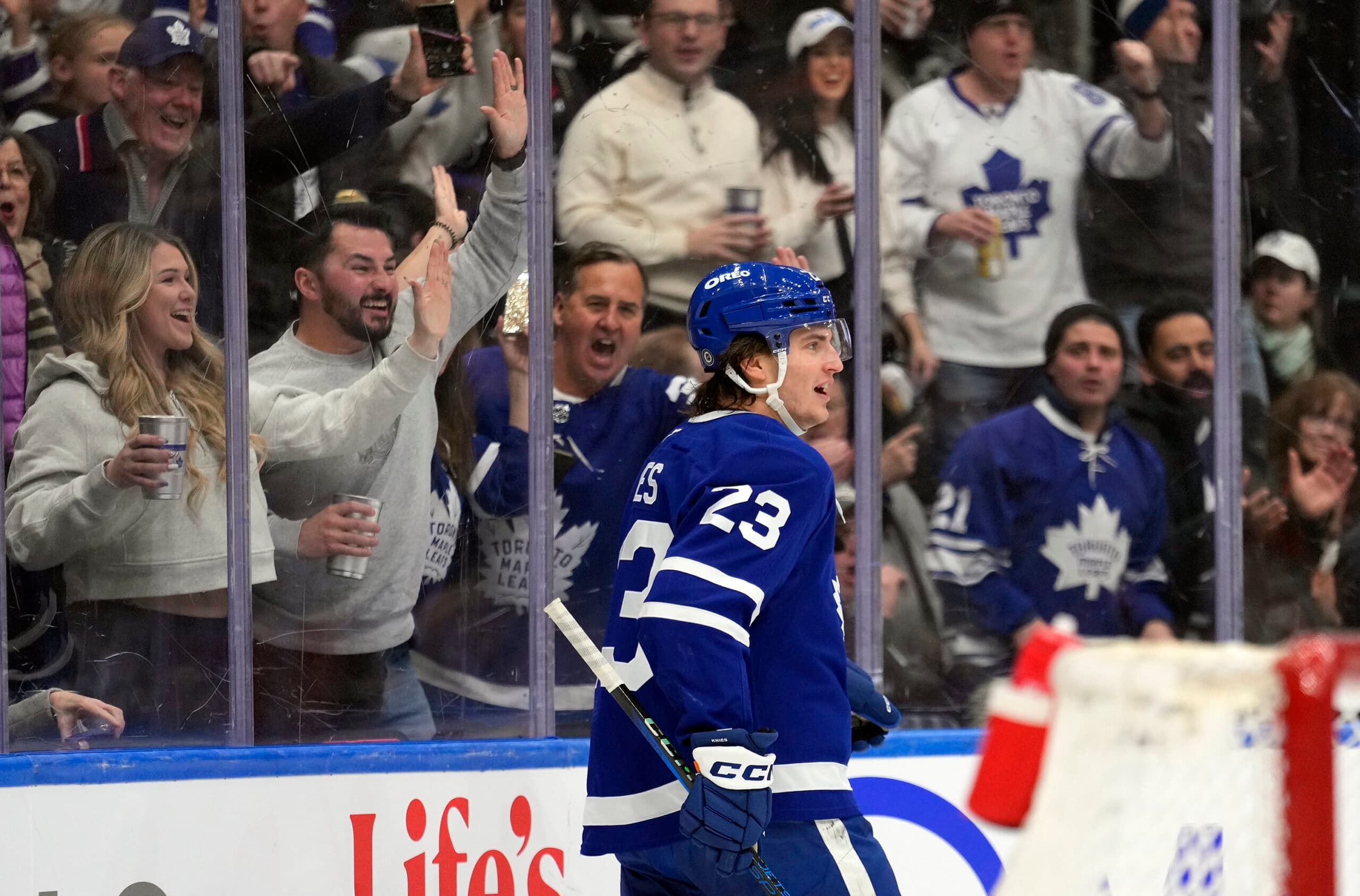 Matthew Knies after scoring, fans in the background